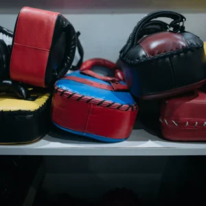 Stack of curved boxing focus mitts