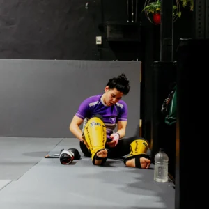 Fighter wearing leather Muay Thai shin guards