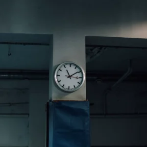 Analogue round timer clock on a gym wall