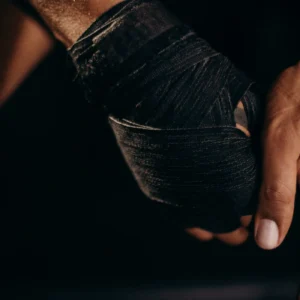 Boxer hands wrapped in stretch hand wraps